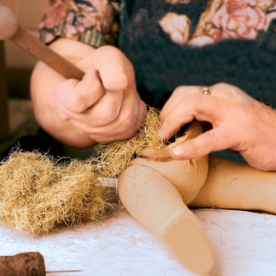 Stuffing doll body with reindeer hair